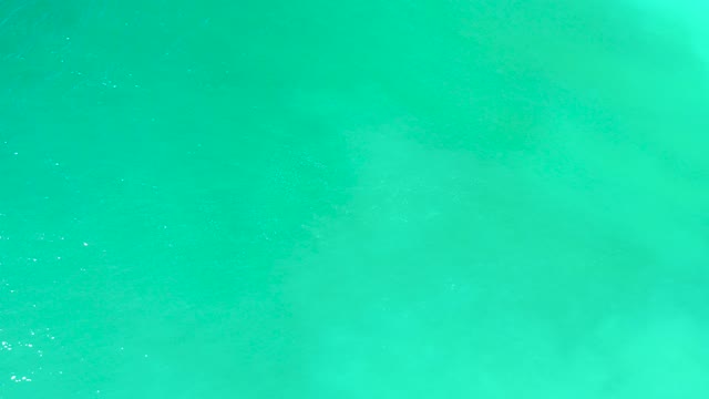 DREAMS LOS CABOS BCS MEXICO-2021: Spreading Foam on Turquoise Ocean Surface