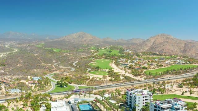 DREAMS LOS CABOS BCS MEXICO-2021: Golf Course and Highway in Desert Landscape