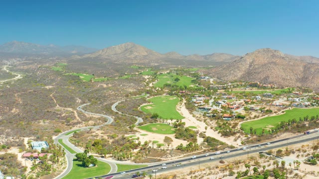 DREAMS LOS CABOS BCS MEXICO-2021: Golf Course and Highway with Moving Traffic