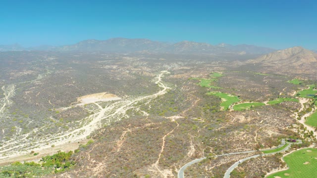 DREAMS LOS CABOS BCS MEXICO-2021: Mountain Valley with Winding Roads and Green Patches