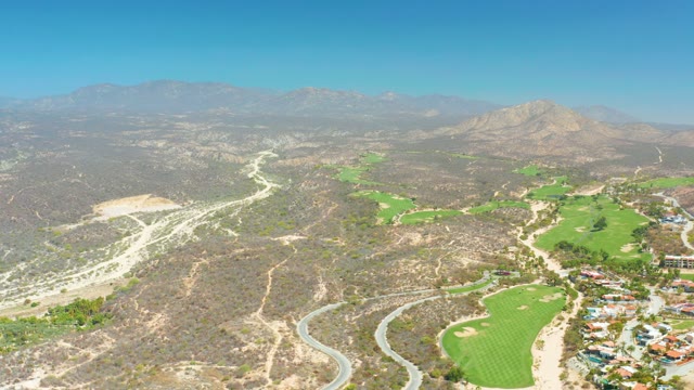 DREAMS LOS CABOS BCS MEXICO-2021: Car Traveling on Winding Mountain Road