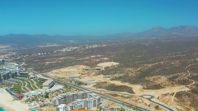 DREAMS LOS CABOS BCS MEXICO-2021: Coastal Development with Road and Distant Mountains