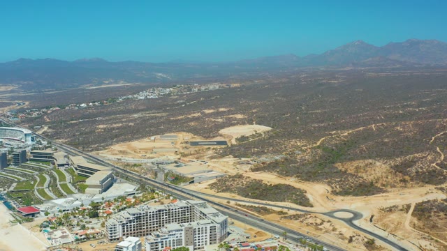 DREAMS LOS CABOS BCS MEXICO-2021: Highway and Buildings in a Hilly Landscape