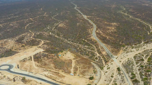 DREAMS LOS CABOS BCS MEXICO-2021: Vehicles Moving on Desert Roads From Above