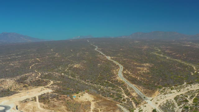 DREAMS LOS CABOS BCS MEXICO-2021: Winding Road Through Dry Hills with Vehicle Activity