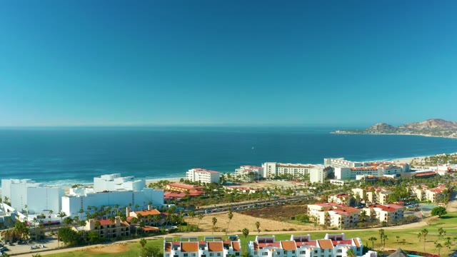 SAN JOSE DEL CABO BCS MEXICO-2021: Aerial Pan of Coastal Buildings and Beach