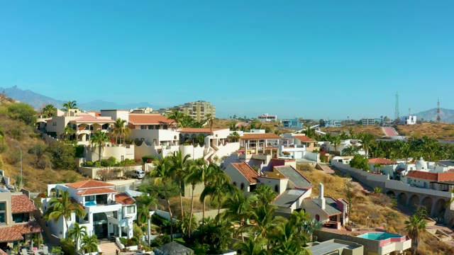 SAN JOSE DEL CABO BCS MEXICO-2021: Hillside Residential Area with Pools and Palm Trees