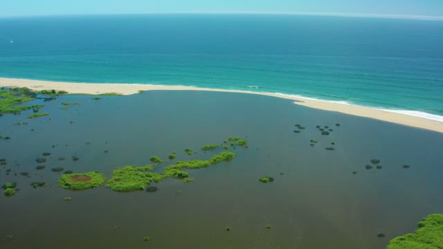 SAN JOSE DEL CABO BCS MEXICO-2021: Coastal Lagoon and Sandy Shore with Ocean Waves