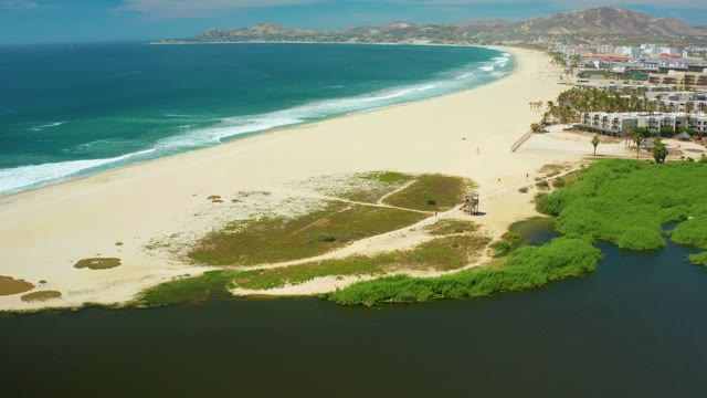 SAN JOSE DEL CABO BCS MEXICO-2021: Sandy Beach with Ocean and Coastal Greenery
