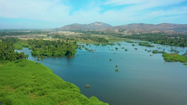 SAN JOSE DEL CABO BCS MEXICO-2021: Lagoon with Scattered Green Islands and Distant Mountains
