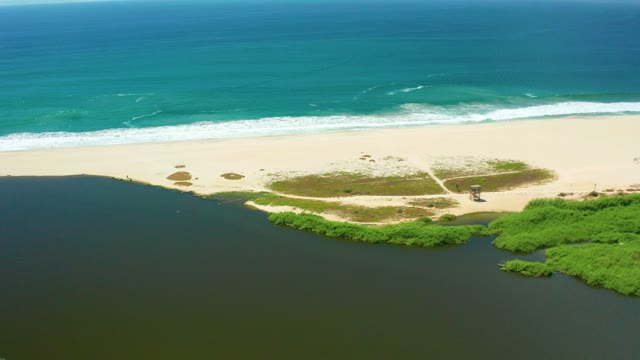 SAN JOSE DEL CABO BCS MEXICO-2021: River Estuary Flowing Into Ocean at Sandy Beach