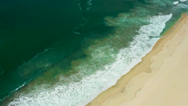 SAN JOSE DEL CABO BCS MEXICO-2021: Ocean Waves Rolling Onto Sandy Shore