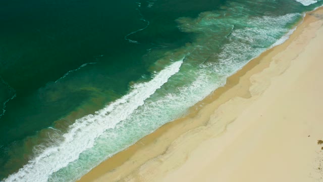 SAN JOSE DEL CABO BCS MEXICO-2021: Waves Rolling Onto Sandy Shore From Aerial View