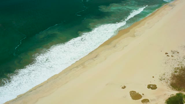 SAN JOSE DEL CABO BCS MEXICO-2021: Ocean Waves Rolling Onto Sandy Shore