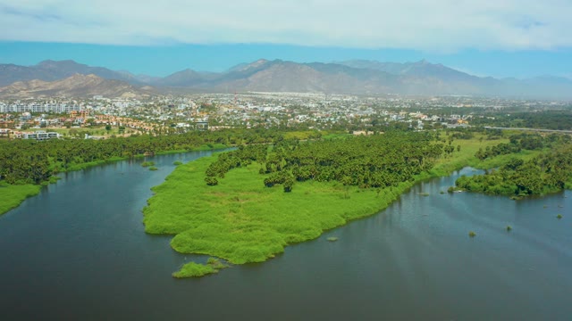 SAN JOSE DEL CABO BCS MEXICO-2021: Lush Island in a River with Gentle Ripples