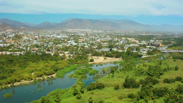 SAN JOSE DEL CABO BCS MEXICO-2021: Lush River Valley with Town and Distant Mountains