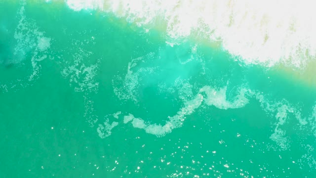 MARQUIS LOS CABOS BCS MEXICO-2021: Breaking Ocean Wave with White Foam and Turquoise Water