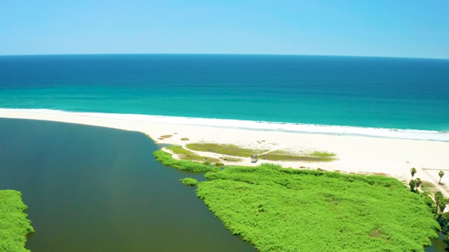 SAN JOSE DEL CABO ESTUARY BCS MEXICO-2021: River Merging with Ocean at Sandy Shore