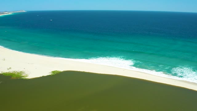 SAN JOSE DEL CABO ESTUARY BCS MEXICO-2021: Waves Rolling Onto a White Sandy Shore