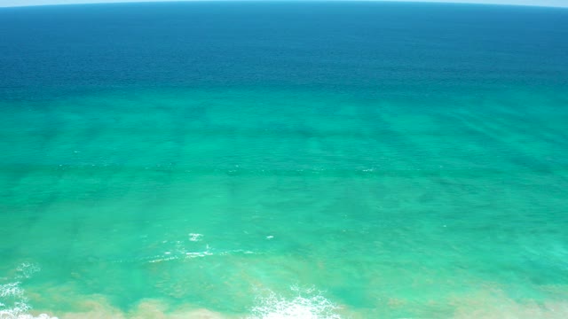 SAN JOSE DEL CABO ESTUARY BCS MEXICO-2021: Receding Ocean Waves in Clear Turquoise Water