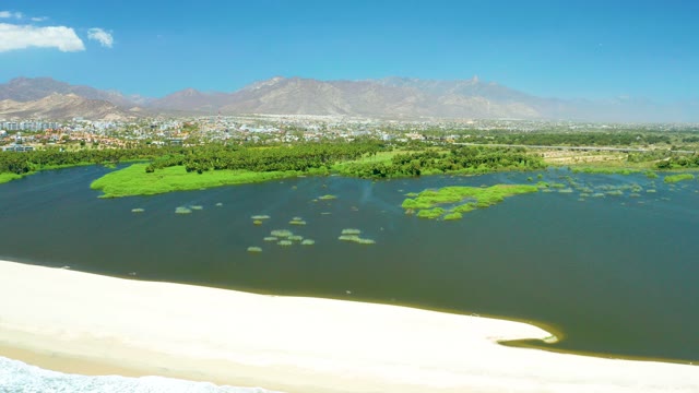 SAN JOSE DEL CABO ESTUARY BCS MEXICO-2021: Rising Water Submerging Sandy Shore and Lagoon Islands