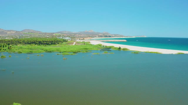 SAN JOSE DEL CABO ESTUARY BCS MEXICO-2021: Coastal Wetland and Sandy Shore with Receding Water