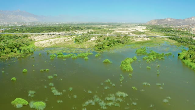 SAN JOSE DEL CABO ESTUARY BCS MEXICO-2021: Aerial Flooded River with Vegetation Patches