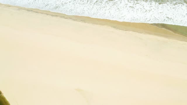 SAN JOSE DEL CABO ESTUARY BCS MEXICO-2021: Ocean Waves Rolling Onto Sandy Beach