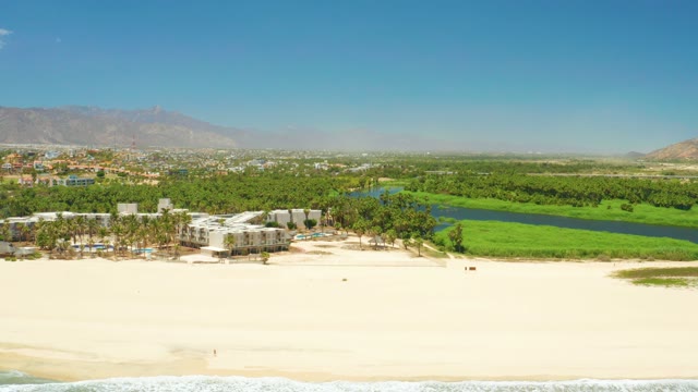SAN JOSE DEL CABO ESTUARY BCS MEXICO-2021: Sandy Beach and Lagoon with Distant Mountains
