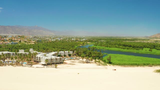 SAN JOSE DEL CABO ESTUARY BCS MEXICO-2021: Sandy Beach with Lagoon and Coastal Development