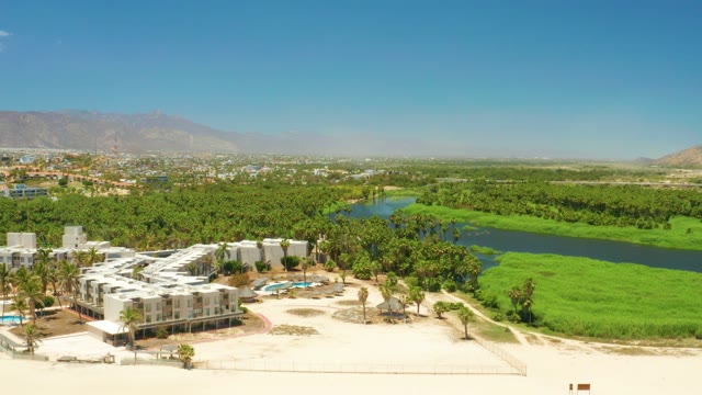 SAN JOSE DEL CABO ESTUARY BCS MEXICO-2021: Coastal Resort, Lagoon, and Mountain Backdrop