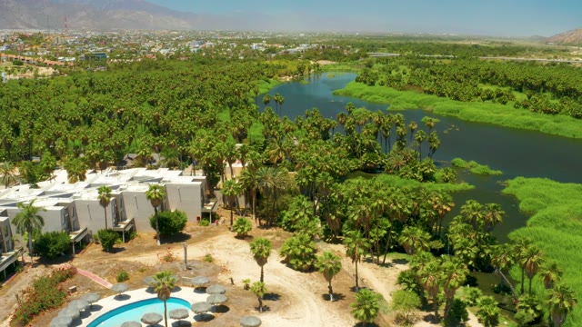 SAN JOSE DEL CABO ESTUARY BCS MEXICO-2021: Resort Pool and Algae-Filled Lake Aerial