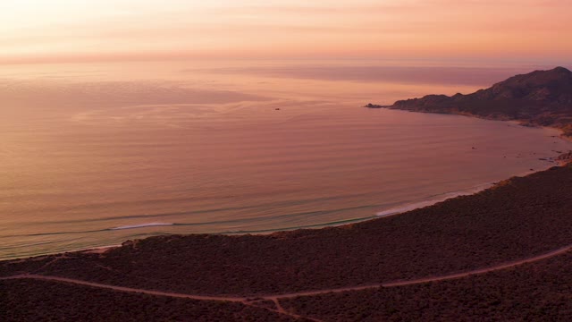 CABO PULMO BCS MEXICO-2021: Coastal Sunset Over Winding Road and Ocean