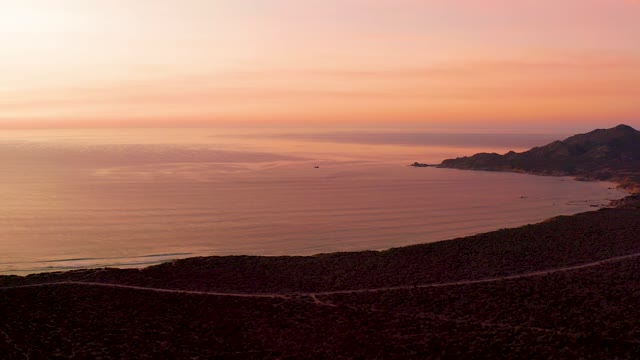 CABO PULMO BCS MEXICO-2021: Coastal Sunset with Winding Road and Calm Ocean