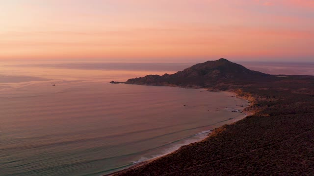 CABO PULMO BCS MEXICO-2021: Gentle Waves Rolling Along Sandy Coast at Sunset