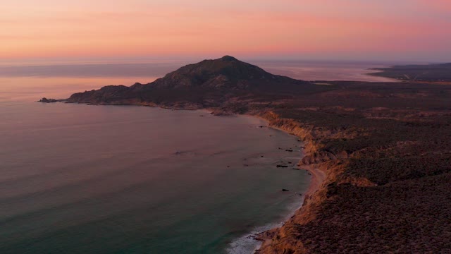 CABO PULMO BCS MEXICO-2021: Coastal Road Along Mountain and Ocean at Sunset