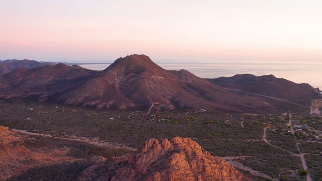 CABO PULMO BCS MEXICO-2021: Sunset Over Mountain Valley and Coastal Scene