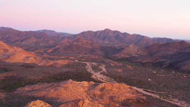 CABO PULMO BCS MEXICO-2021: Desert Mountains and Winding Dirt Road at Dawn