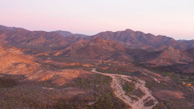 CABO PULMO BCS MEXICO-2021: Desert Mountain Range and Winding Road at Dusk