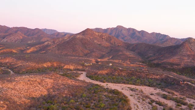 CABO PULMO BCS MEXICO-2021: Vehicle Moving on Desert Road at Dusk