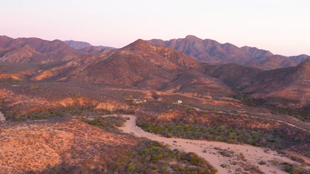 CABO PULMO BCS MEXICO-2021: Desert Landscape with Winding Road and Distant Mountains