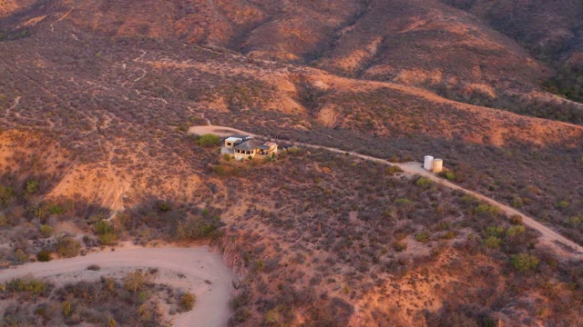 CABO PULMO BCS MEXICO-2021: Remote House on Arid Hillside with Dirt Road