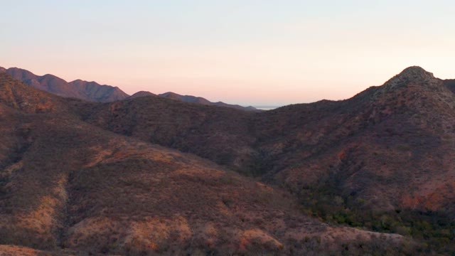 CABO PULMO BCS MEXICO-2021: Descending View of Mountain Ridges at Dusk