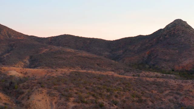 CABO PULMO BCS MEXICO-2021: Arid Valley and Rocky Mountain Range at Dusk