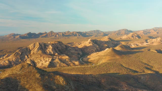 CABO PULMO BCS MEXICO-2021: Shifting Shadows on Desert Hills with Winding Road