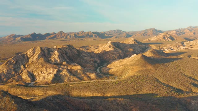 CABO PULMO BCS MEXICO-2021: Car Traveling on Winding Desert Road
