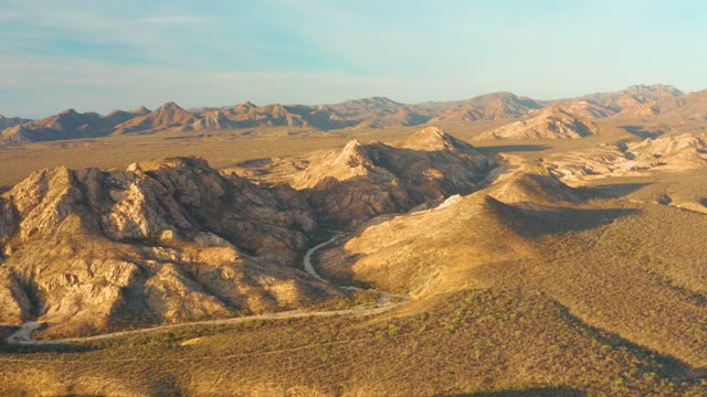 CABO PULMO BCS MEXICO-2021: Winding Road Through Arid Mountain Landscape