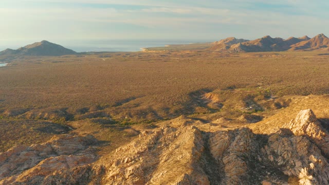 CABO PULMO BCS MEXICO-2021: Rocky Hills and Open Plain with Distant Mountains