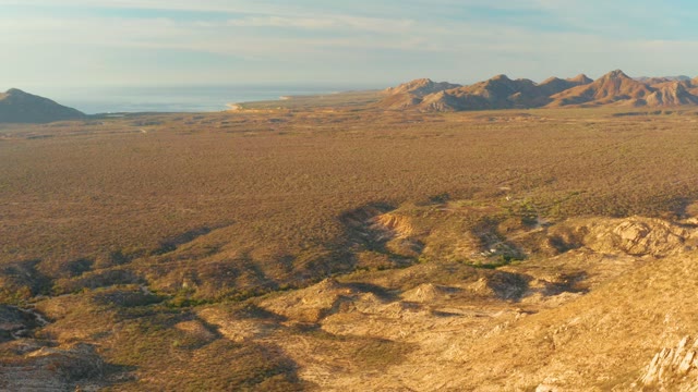 CABO PULMO BCS MEXICO-2021: Vehicle Traveling Across Arid Desert Plain