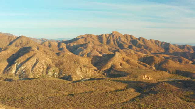 CABO PULMO BCS MEXICO-2021: Vehicle Moving Along a Desert Mountain Road